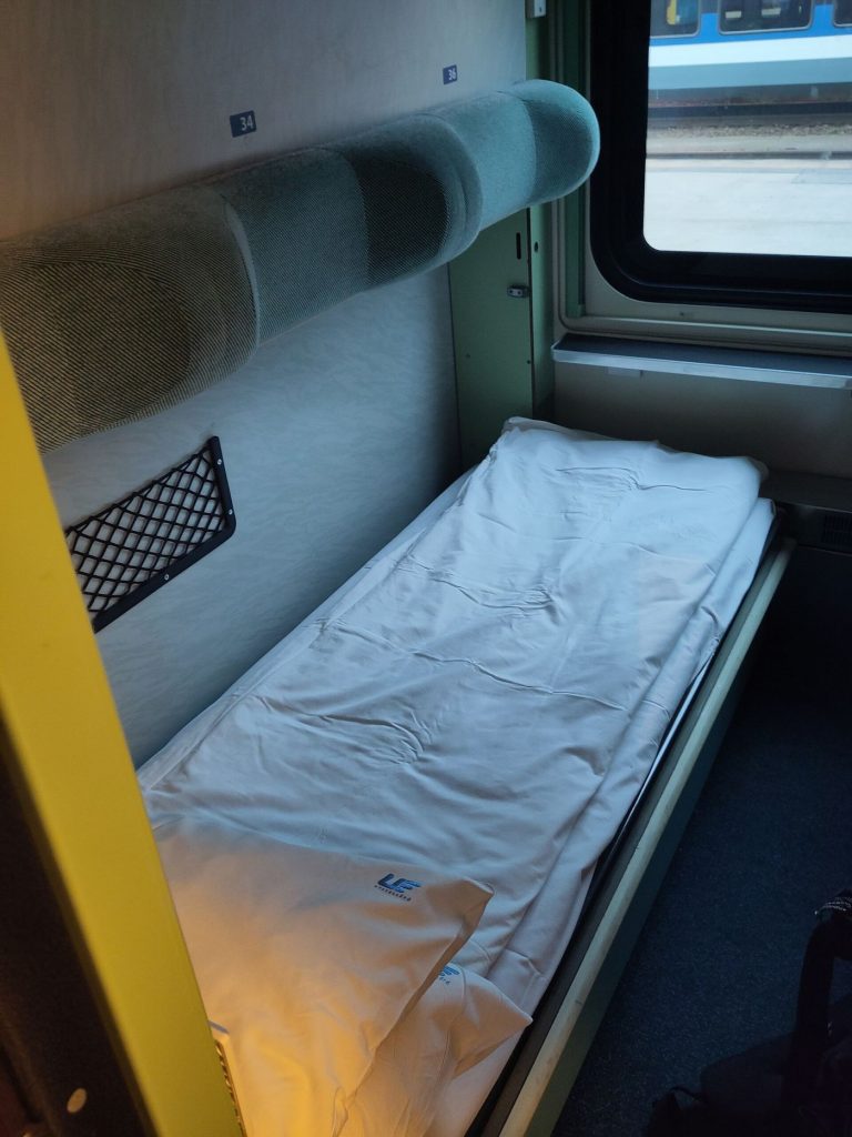 person sleeping peacefully in a dark bedroom